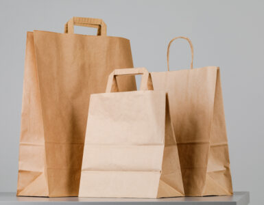 1brown paper bag with handles empty shopping bag with area your logo design food delivery concept