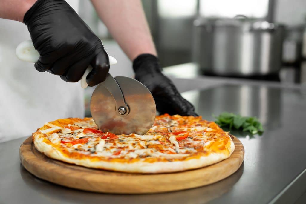 preparing delicious pizza with fresh ingredients 2026 03 17 07 08 34 utc