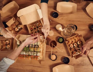 top view of table with sushi on it in paper eco bo 2025 03 18 20 59 34 utc