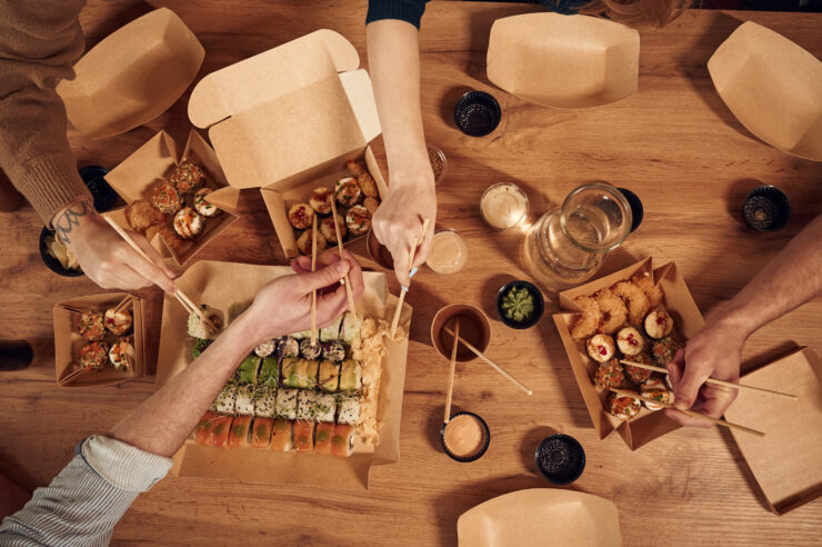 top view of table with sushi on it in paper eco bo 2025 03 18 20 59 34 utc